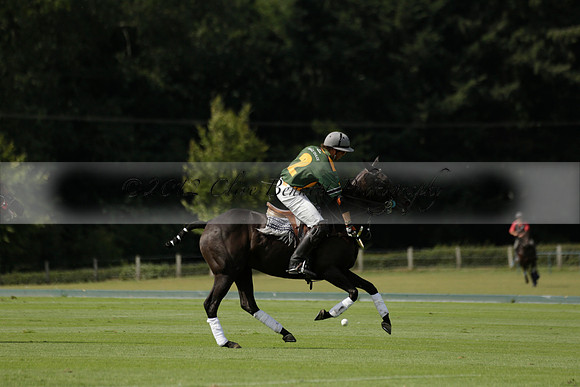 Maiz Dulce (green) v River (blue) in a Uber Polo Midsummer 12 goal polo match on Wednesday 21 August 2013 at Cowdray park Polo Club on Ambersham 2.  www.polopictures.co.uk