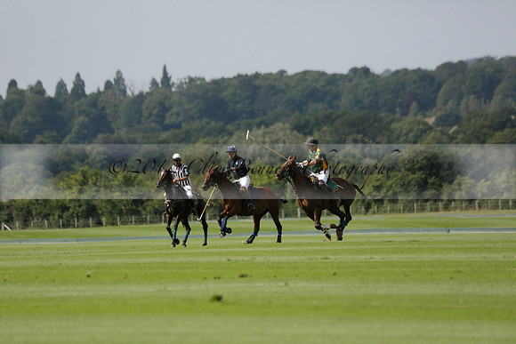 Maiz Dulce (green) v River (blue) in a Uber Polo Midsummer 12 goal polo match on Wednesday 21 August 2013 at Cowdray park Polo Club on Ambersham 2.  www.polopictures.co.uk