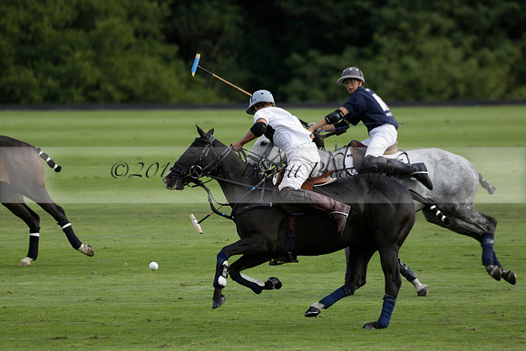 Pandas (white) v Home Farm (navy) in a Park House West Sussex Cup Polo match on Brooksfield at Cowdray Park Polo Club on Friday 30 August 2013. 2013.08.30 www.polopictures.co.uk