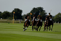 Maiz Dulce (green) v River (blue) in a Uber Polo Midsummer 12 goal polo match on Wednesday 21 August 2013 at Cowdray park Polo Club on Ambersham 2.  www.polopictures.co.uk