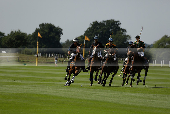 Maiz Dulce (green) v River (blue) in a Uber Polo Midsummer 12 goal polo match on Wednesday 21 August 2013 at Cowdray park Polo Club on Ambersham 2.  www.polopictures.co.uk
