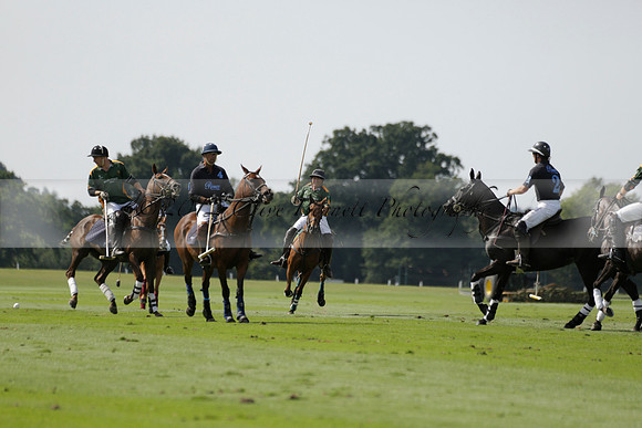 Maiz Dulce (green) v River (blue) in a Uber Polo Midsummer 12 goal polo match on Wednesday 21 August 2013 at Cowdray park Polo Club on Ambersham 2.  www.polopictures.co.uk