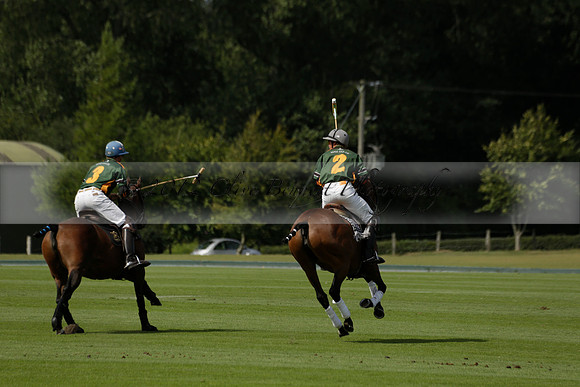 Maiz Dulce (green) v River (blue) in a Uber Polo Midsummer 12 goal polo match on Wednesday 21 August 2013 at Cowdray park Polo Club on Ambersham 2.  www.polopictures.co.uk