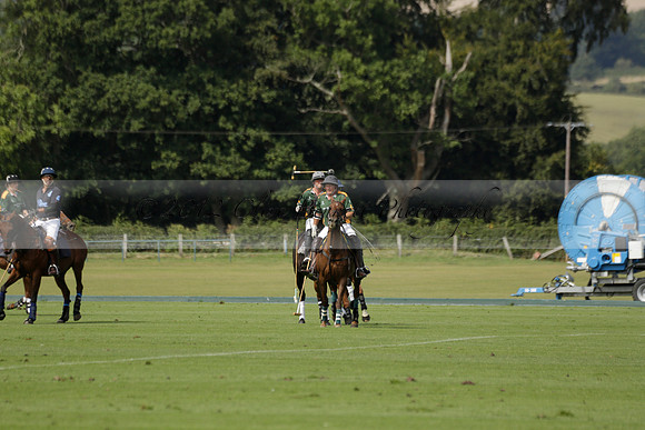 Maiz Dulce (green) v River (blue) in a Uber Polo Midsummer 12 goal polo match on Wednesday 21 August 2013 at Cowdray park Polo Club on Ambersham 2.  www.polopictures.co.uk