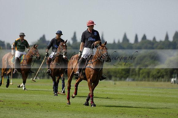 Maiz Dulce (green) v River (blue) in a Uber Polo Midsummer 12 goal polo match on Wednesday 21 August 2013 at Cowdray park Polo Club on Ambersham 2.  www.polopictures.co.uk