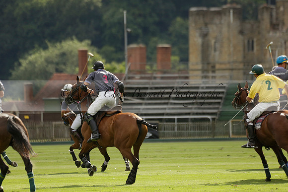 La Tremenda (lilac) v Maiz Dulce (yellow) in a Brecknock Cup polo match played on Lawns 1 at the Cowdray Park Polo Club on Tuesday 13 August 2013