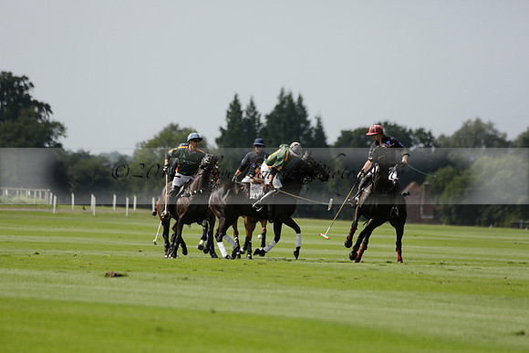 Maiz Dulce (green) v River (blue) in a Uber Polo Midsummer 12 goal polo match on Wednesday 21 August 2013 at Cowdray park Polo Club on Ambersham 2.  www.polopictures.co.uk