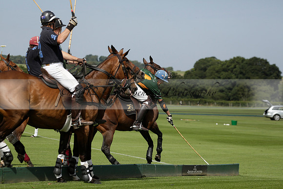 Maiz Dulce (green) v River (blue) in a Uber Polo Midsummer 12 goal polo match on Wednesday 21 August 2013 at Cowdray park Polo Club on Ambersham 2.  www.polopictures.co.uk