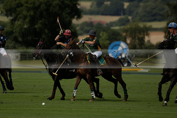 Maiz Dulce (green) v River (blue) in a Uber Polo Midsummer 12 goal polo match on Wednesday 21 August 2013 at Cowdray park Polo Club on Ambersham 2.  www.polopictures.co.uk