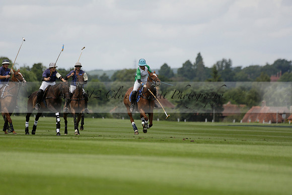 Burningfold (blue) v Wairakei Pastoral (green) in the Ruins Cup Final on Sunday 04 August 2013.