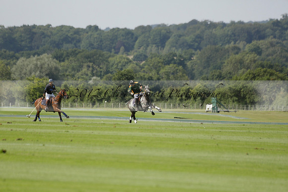 Maiz Dulce (green) v River (blue) in a Uber Polo Midsummer 12 goal polo match on Wednesday 21 August 2013 at Cowdray park Polo Club on Ambersham 2.  www.polopictures.co.uk