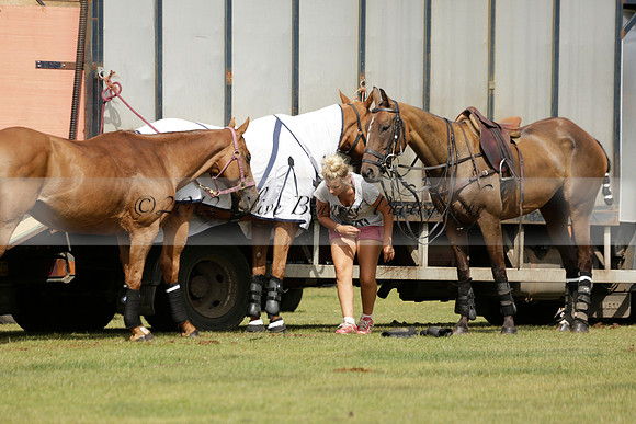 Maiz Dulce (green) v River (blue) in a Uber Polo Midsummer 12 goal polo match on Wednesday 21 August 2013 at Cowdray park Polo Club on Ambersham 2.  www.polopictures.co.uk