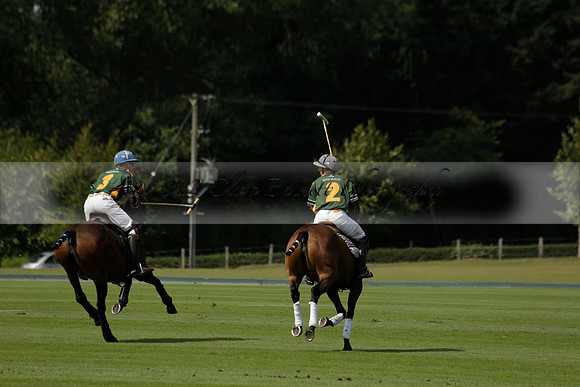 Maiz Dulce (green) v River (blue) in a Uber Polo Midsummer 12 goal polo match on Wednesday 21 August 2013 at Cowdray park Polo Club on Ambersham 2.  www.polopictures.co.uk
