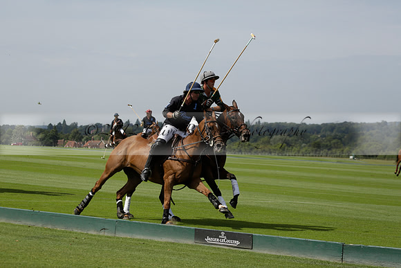 Maiz Dulce (green) v River (blue) in a Uber Polo Midsummer 12 goal polo match on Wednesday 21 August 2013 at Cowdray park Polo Club on Ambersham 2.  www.polopictures.co.uk