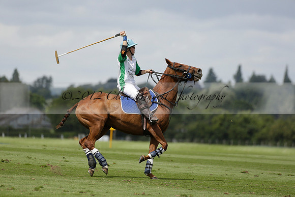 Burningfold (blue) v Wairakei Pastoral (green) in the Ruins Cup Final on Sunday 04 August 2013.