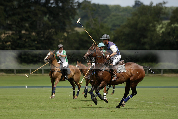 Burningfold (blue) v Wairakei Pastoral (green) in the Ruins Cup Final on Sunday 04 August 2013.