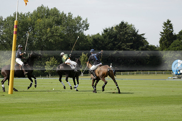 Maiz Dulce (green) v River (blue) in a Uber Polo Midsummer 12 goal polo match on Wednesday 21 August 2013 at Cowdray park Polo Club on Ambersham 2.  www.polopictures.co.uk
