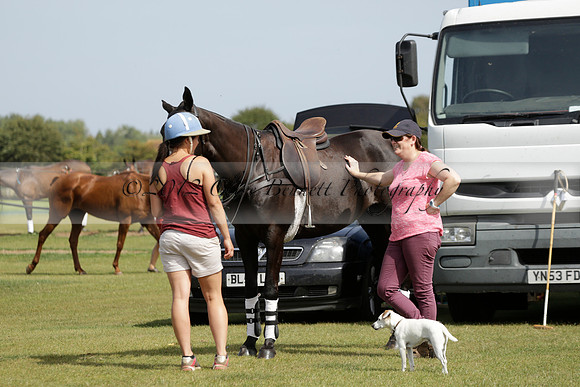 Maiz Dulce (green) v River (blue) in a Uber Polo Midsummer 12 goal polo match on Wednesday 21 August 2013 at Cowdray park Polo Club on Ambersham 2.  www.polopictures.co.uk
