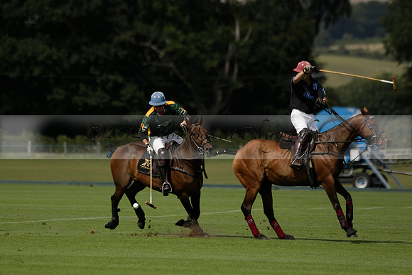 Maiz Dulce (green) v River (blue) in a Uber Polo Midsummer 12 goal polo match on Wednesday 21 August 2013 at Cowdray park Polo Club on Ambersham 2.  www.polopictures.co.uk