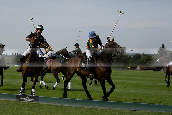 Maiz Dulce (green) v River (blue) in a Uber Polo Midsummer 12 goal polo match on Wednesday 21 August 2013 at Cowdray park Polo Club on Ambersham 2.  www.polopictures.co.uk