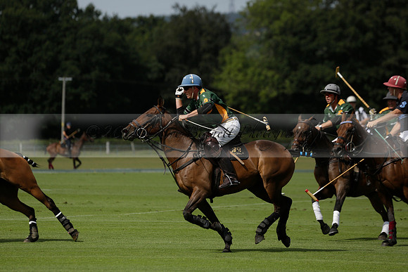Maiz Dulce (green) v River (blue) in a Uber Polo Midsummer 12 goal polo match on Wednesday 21 August 2013 at Cowdray park Polo Club on Ambersham 2.  www.polopictures.co.uk