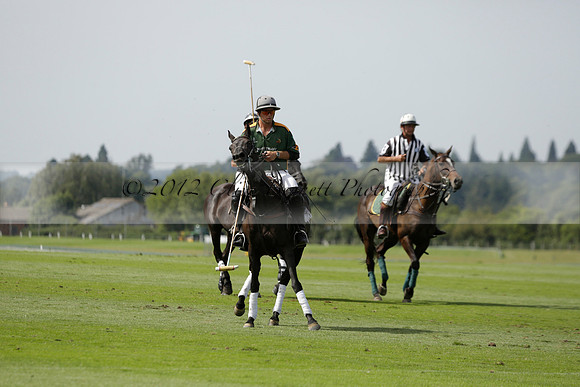 Maiz Dulce (green) v River (blue) in a Uber Polo Midsummer 12 goal polo match on Wednesday 21 August 2013 at Cowdray park Polo Club on Ambersham 2.  www.polopictures.co.uk
