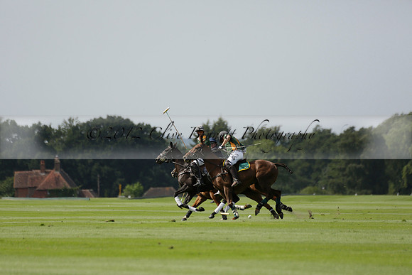 Maiz Dulce (green) v River (blue) in a Uber Polo Midsummer 12 goal polo match on Wednesday 21 August 2013 at Cowdray park Polo Club on Ambersham 2.  www.polopictures.co.uk
