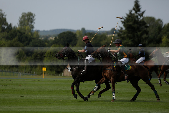 Maiz Dulce (green) v River (blue) in a Uber Polo Midsummer 12 goal polo match on Wednesday 21 August 2013 at Cowdray park Polo Club on Ambersham 2.  www.polopictures.co.uk