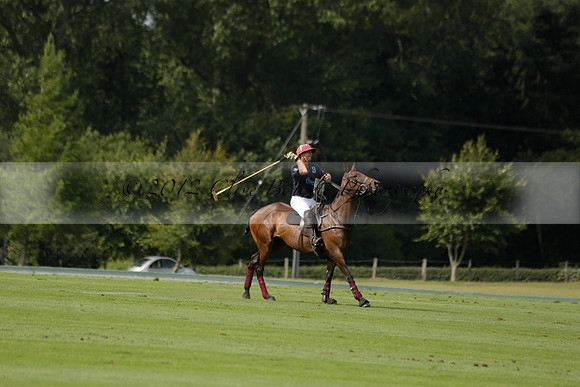 Maiz Dulce (green) v River (blue) in a Uber Polo Midsummer 12 goal polo match on Wednesday 21 August 2013 at Cowdray park Polo Club on Ambersham 2.  www.polopictures.co.uk