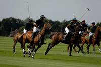 Maiz Dulce (green) v River (blue) in a Uber Polo Midsummer 12 goal polo match on Wednesday 21 August 2013 at Cowdray park Polo Club on Ambersham 2.  www.polopictures.co.uk