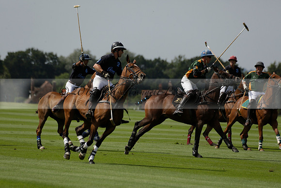 Maiz Dulce (green) v River (blue) in a Uber Polo Midsummer 12 goal polo match on Wednesday 21 August 2013 at Cowdray park Polo Club on Ambersham 2.  www.polopictures.co.uk