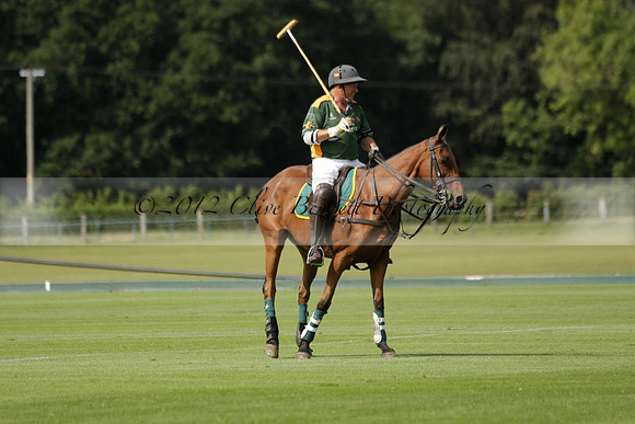 Maiz Dulce (green) v River (blue) in a Uber Polo Midsummer 12 goal polo match on Wednesday 21 August 2013 at Cowdray park Polo Club on Ambersham 2.  www.polopictures.co.uk