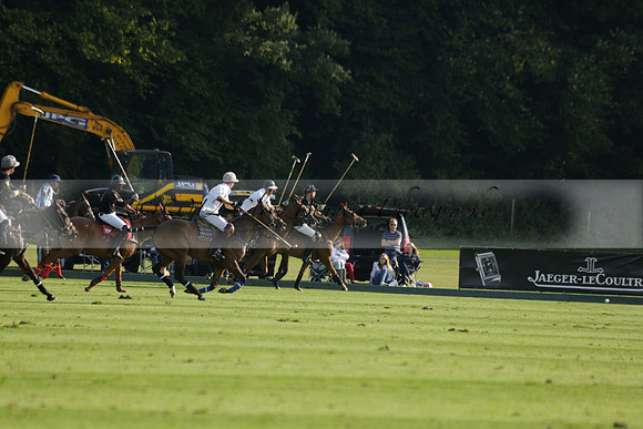 Pluma Negra (white) v Shoreline (black) in the Brecknock Cup Subsidiary final polo match played on Sunday 25 August 2013 at Cowdray Park Polo Club on Ambersham 1. 2013.10.12 www.polopictures.co.uk