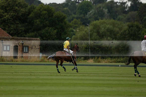 La Tremenda (lilac) v Maiz Dulce (yellow) in a Brecknock Cup polo match played on Lawns 1 at the Cowdray Park Polo Club on Tuesday 13 August 2013