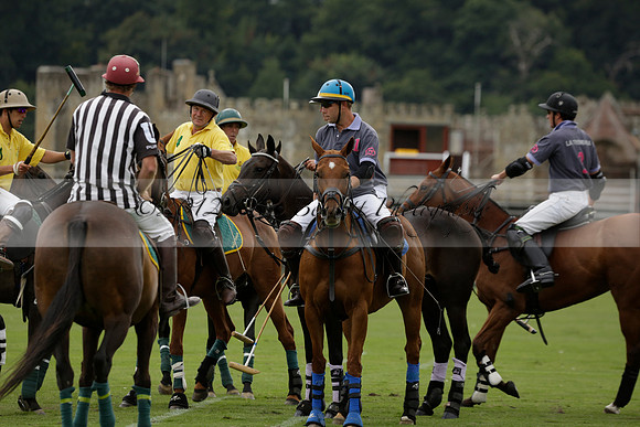 La Tremenda (lilac) v Maiz Dulce (yellow) in a Brecknock Cup polo match played on Lawns 1 at the Cowdray Park Polo Club on Tuesday 13 August 2013