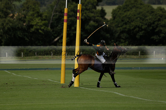 Maiz Dulce (green) v River (blue) in a Uber Polo Midsummer 12 goal polo match on Wednesday 21 August 2013 at Cowdray park Polo Club on Ambersham 2.  www.polopictures.co.uk