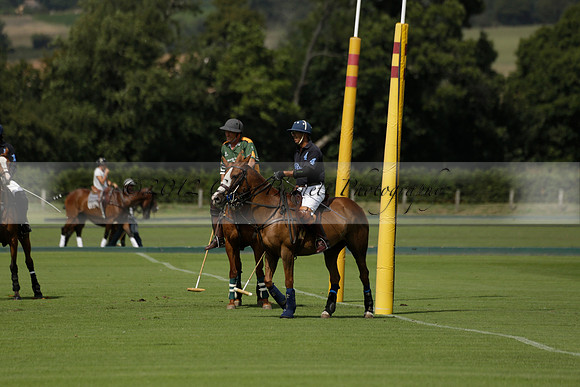 Maiz Dulce (green) v River (blue) in a Uber Polo Midsummer 12 goal polo match on Wednesday 21 August 2013 at Cowdray park Polo Club on Ambersham 2.  www.polopictures.co.uk