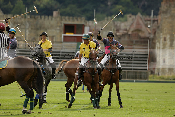 La Tremenda (lilac) v Maiz Dulce (yellow) in a Brecknock Cup polo match played on Lawns 1 at the Cowdray Park Polo Club on Tuesday 13 August 2013