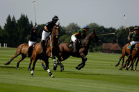 Maiz Dulce (green) v River (blue) in a Uber Polo Midsummer 12 goal polo match on Wednesday 21 August 2013 at Cowdray park Polo Club on Ambersham 2.  www.polopictures.co.uk