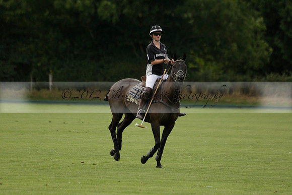 Beau Design v Boscom in an August Rother Cup 4 goal polo match at Cowdray Park Polo Club on Wednesday 07 August 2013