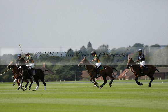 Maiz Dulce (green) v River (blue) in a Uber Polo Midsummer 12 goal polo match on Wednesday 21 August 2013 at Cowdray park Polo Club on Ambersham 2.  www.polopictures.co.uk