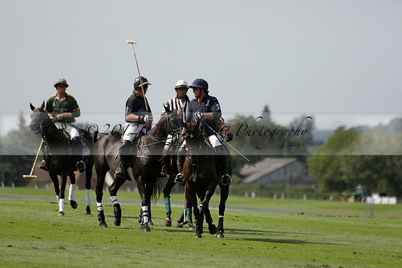 Maiz Dulce (green) v River (blue) in a Uber Polo Midsummer 12 goal polo match on Wednesday 21 August 2013 at Cowdray park Polo Club on Ambersham 2.  www.polopictures.co.uk