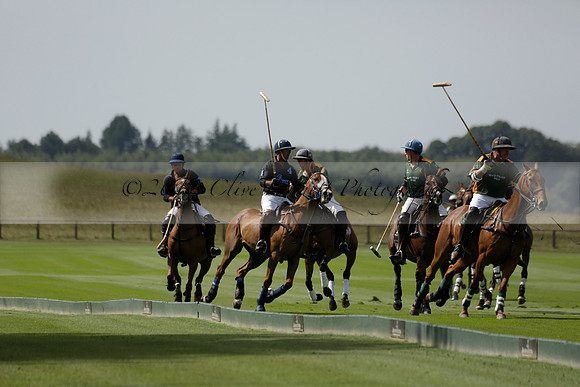 Maiz Dulce (green) v River (blue) in a Uber Polo Midsummer 12 goal polo match on Wednesday 21 August 2013 at Cowdray park Polo Club on Ambersham 2.  www.polopictures.co.uk
