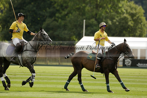 La Tremenda (lilac) v Maiz Dulce (yellow) in a Brecknock Cup polo match played on Lawns 1 at the Cowdray Park Polo Club on Tuesday 13 August 2013