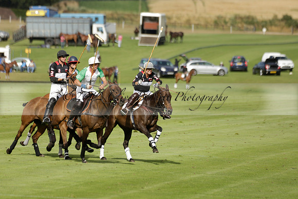 Jaeger Le Coultre (black)  v Wairakei Pastoral (white) in a Jaeger Le Coultre Holden White Cup polo match played on 29 July 2013 at Cowdray Park Polo Club on Brooksfieldwww.polopictures.co.uk