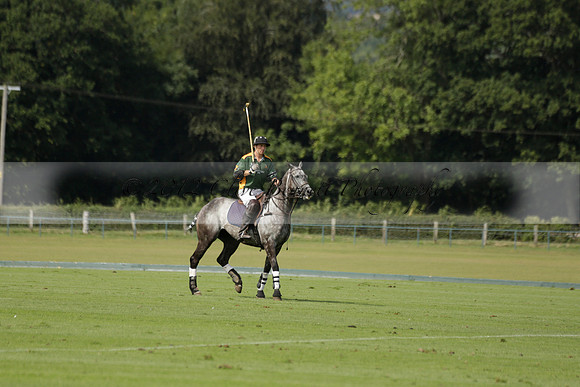 Maiz Dulce (green) v River (blue) in a Uber Polo Midsummer 12 goal polo match on Wednesday 21 August 2013 at Cowdray park Polo Club on Ambersham 2.  www.polopictures.co.uk