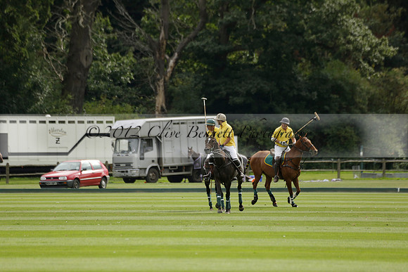 La Tremenda (lilac) v Maiz Dulce (yellow) in a Brecknock Cup polo match played on Lawns 1 at the Cowdray Park Polo Club on Tuesday 13 August 2013