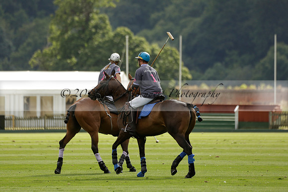 La Tremenda (lilac) v Maiz Dulce (yellow) in a Brecknock Cup polo match played on Lawns 1 at the Cowdray Park Polo Club on Tuesday 13 August 2013