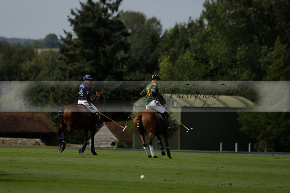 Maiz Dulce (green) v River (blue) in a Uber Polo Midsummer 12 goal polo match on Wednesday 21 August 2013 at Cowdray park Polo Club on Ambersham 2.  www.polopictures.co.uk