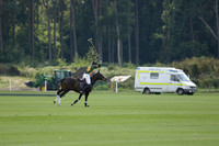 La Tremenda (mauve) v Maiz Dulce (green) in the Brecknock Cup  final polo match. Played at Cowdray Park Polo Club on Sunday 25 August 2013 on Ambersham 1. www.polopictures.co.uk